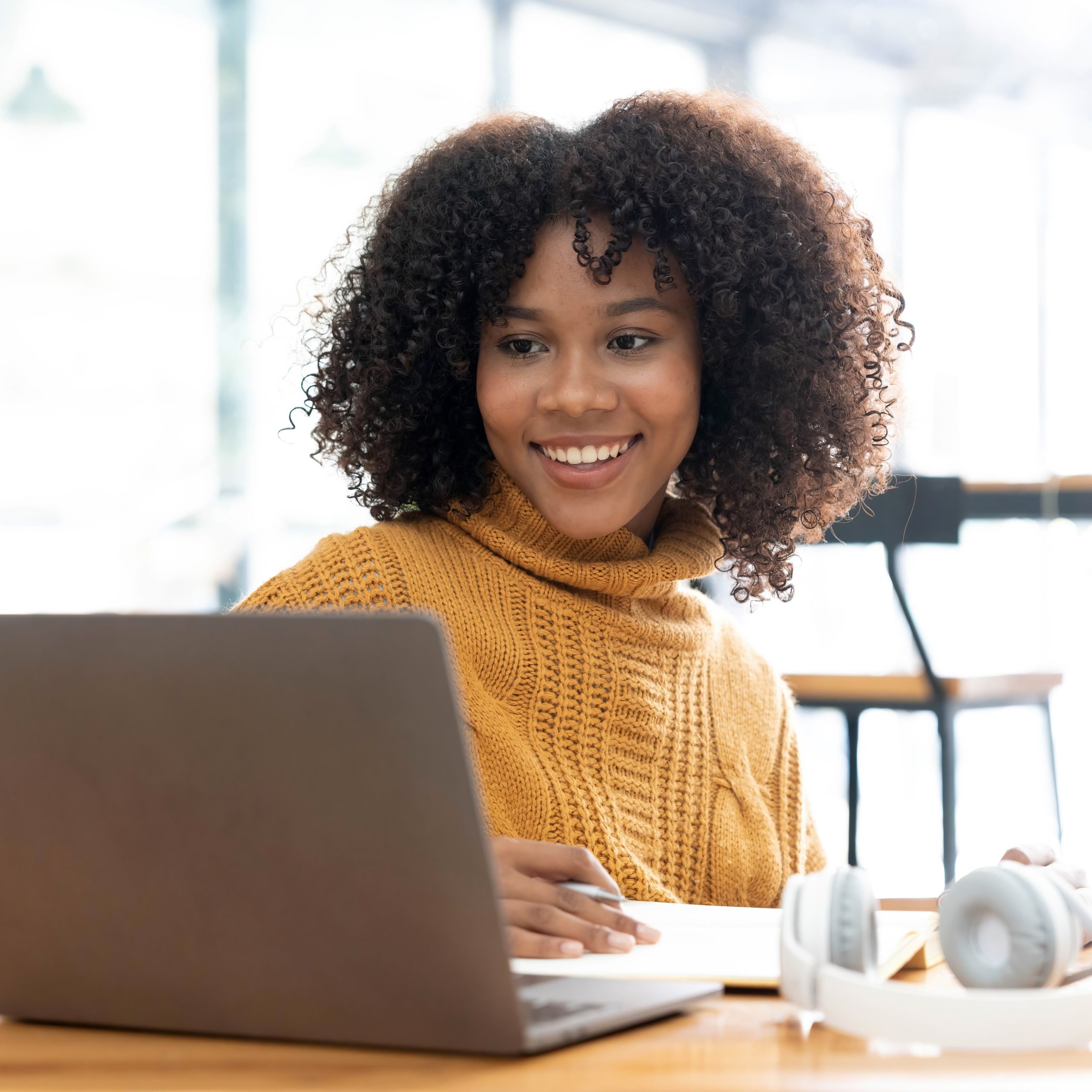 A Texas woman searching on her laptop "How Does the Abortion Pill Work?"