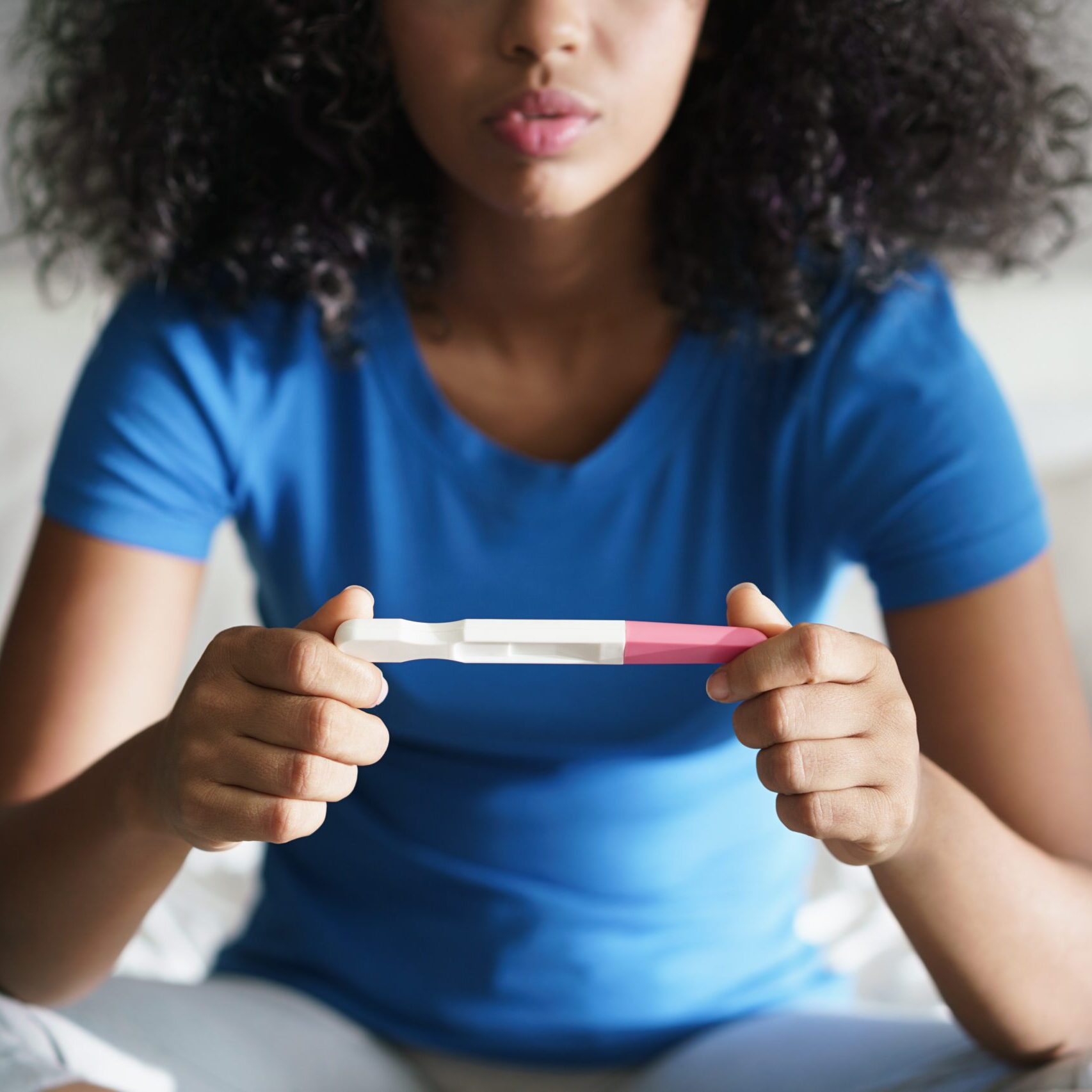 A Texas woman searching on her laptop "How Does the Abortion Pill Work?"